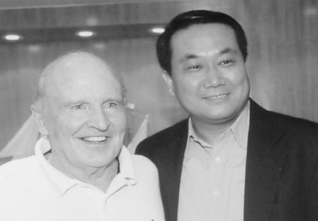 C.J. Liu, founder and Chairman of PPG and Jack Welch, Chairman and CEO of General Electric